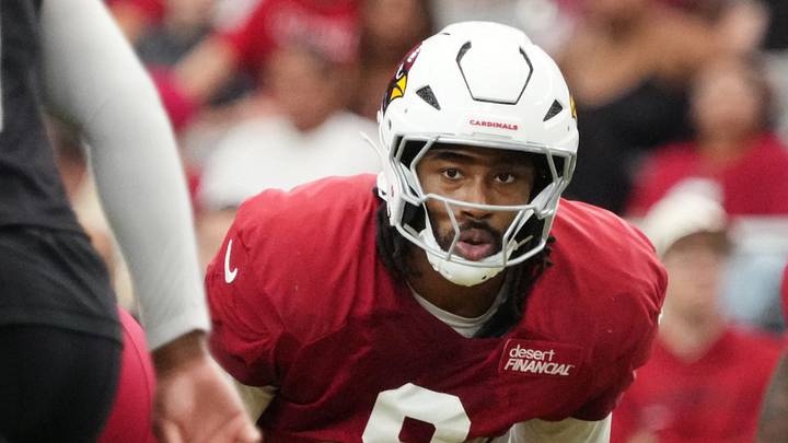 Arizona Cardinals linebacker BJ Ojulari (9) gets set at the line of scrimmage during their training camp red and white practice at State Farm Stadium in Glendale on Aug. 9, 2026. Arizona Cardinals linebacker BJ Ojulari (9) gets set at the line of scrimmage during their training camp red and white practice at State Farm Stadium in Glendale on Aug. 9, 2026.
