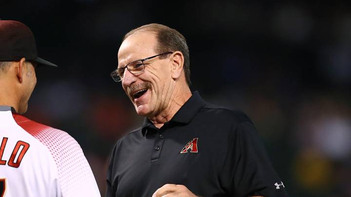 May 1, 2019; Phoenix, AZ, USA; Arizona Diamondbacks manager Torey Lovullo (left) shakes hands with former manager Bob Brenly after throwing out the first pitch prior to the game against the New York Yankees at Chase Field. Mandatory Credit: Mark J. Rebilas-Imagn Images