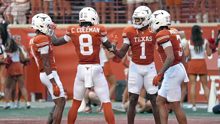 Texas Longhorns wide receiver Cam Coleman celebrates with wide receiver Ryan Wingo and teammates. Mandatory Credit: Scott Wachter-Imagn Images Texas Longhorns wide receiver Cam Coleman celebrates with wide receiver Ryan Wingo and teammates. Mandatory Credit: Scott Wachter-Imagn Images