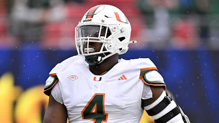 Nov 1, 2025; Dallas, Texas, USA;  SMU Miami Hurricanes defensive lineman Rueben Bain Jr. (4) warms up before the game against the SMU Mustangs at Gerald J. Ford Stadium. Mandatory Credit: Jerome Miron-Imagn Images