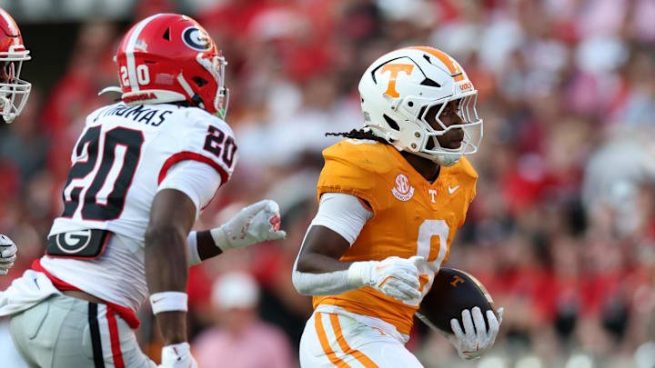 Sep 13, 2025; Knoxville, Tennessee, USA; Tennessee Volunteers defensive back Colton Hood (8) runs the ball against Georgia Bulldogs defensive back JaCorey Thomas (20) at Neyland Stadium. Mandatory Credit: Alan Poizner-Imagn Images Sep 13, 2025; Knoxville, Tennessee, USA; Tennessee Volunteers defensive back Colton Hood (8) runs the ball against Georgia Bulldogs defensive back JaCorey Thomas (20) at Neyland Stadium. Mandatory Credit: Alan Poizner-Imagn Images