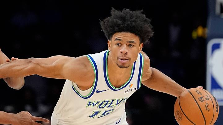 Oct 14, 2026; Minneapolis, Minnesota, USA;  Minnesota Timberwolves guard Zyon Pullin (15) works around Detroit Pistons guard Ebuka Okorie (23) in the fourth quarter at Target Center.  Mandatory Credit: Bruce Kluckhohn-Imagn Images