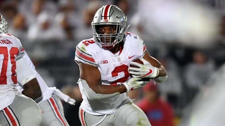 Sep 29, 2018; University Park, PA, USA; Ohio State Buckeyes running back J.K. Dobbins (2) carries the ball en route to scoring a touchdown in the third quarter against the Penn State Nittany Lions at Beaver Stadium. Mandatory Credit: James Lang-Imagn Images
