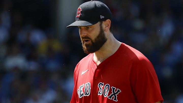 Boston Red Sox starting pitcher Lucas Giolito (54) leaves a baseball game against the Chicago Cubs during the sixth inning at Wrigley Field.