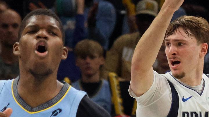 Nov 7, 2025; Memphis, Tennessee, USA; Dallas Mavericks forward Cooper Flagg (32) and Memphis Grizzlies forward Cedric Coward (23) react during the second quarter against the Memphis Grizzlies at FedExForum. Mandatory Credit: Petre Thomas-Imagn Images