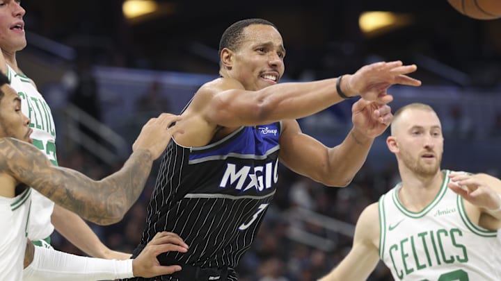 Nov 7, 2025; Orlando, Florida, USA; Orlando Magic guard Desmond Bane (3) passes the ball against the Boston Celtics in the third quarter at Kia Center. Mandatory Credit: Nathan Ray Seebeck-Imagn Images