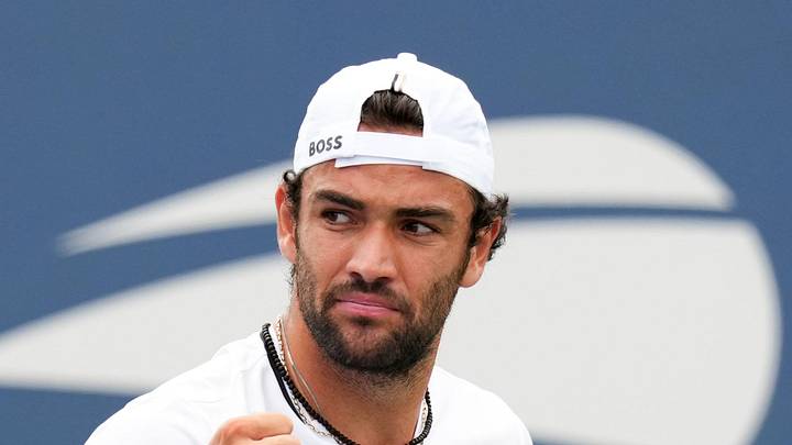 Matteo Berrettini gestures during his match