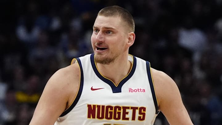 Mar 12, 2025; Denver, Colorado, USA; Denver Nuggets center Nikola Jokic (15) reacts in the second quarter against the Minnesota Timberwolves at Ball Arena. Mandatory Credit: Ron Chenoy-Imagn Images