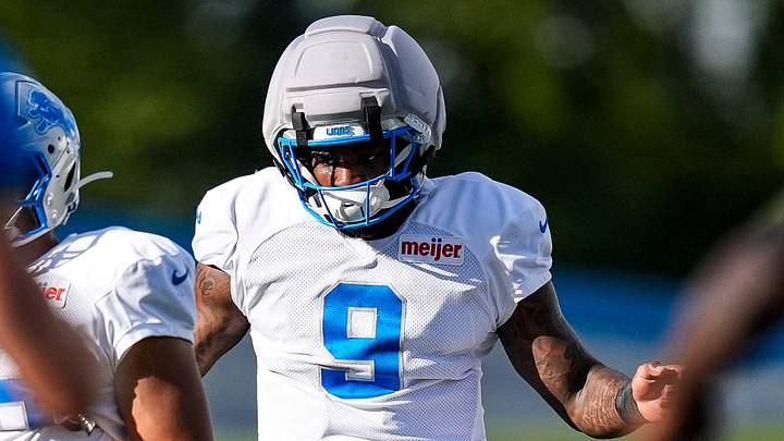 Detroit Lions defensive end Derrick Moore (9) practices during training camp Detroit Lions defensive end Derrick Moore (9) practices during training camp
