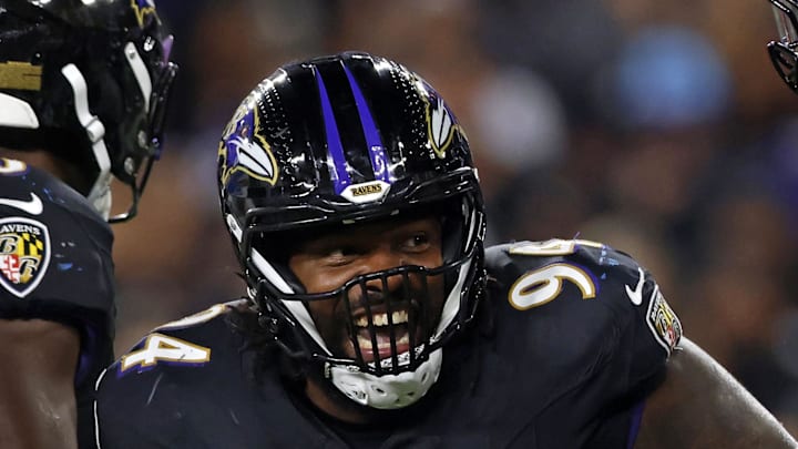 Baltimore Ravens defensive tackle John Jenkins reacts after a play against the Detroit Lions.
