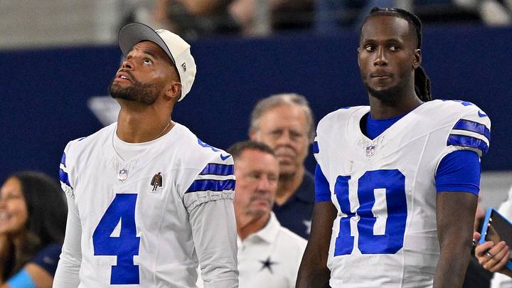 Dallas Cowboys quarterbacks Dak Prescott and Joe Milton III look on during the game between the Cowboys and the Saints.