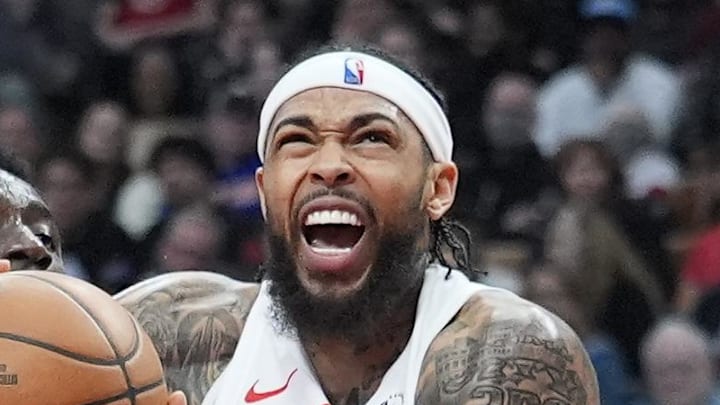 Toronto Raptors forward Brandon Ingram drives to the basket against New York Knicks forward Mohamed Diawara.