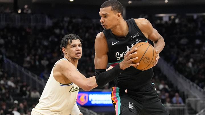 Mar 28, 2026; Milwaukee, Wisconsin, USA; San Antonio Spurs forward Victor Wembanyama (1) spins towards the basket against Milwaukee Bucks forward Ousmane Dieng (21) during the second quarter at Fiserv Forum. Mandatory Credit: Jeff Hanisch-Imagn Images Mar 28, 2026; Milwaukee, Wisconsin, USA; San Antonio Spurs forward Victor Wembanyama (1) spins towards the basket against Milwaukee Bucks forward Ousmane Dieng (21) during the second quarter at Fiserv Forum. Mandatory Credit: Jeff Hanisch-Imagn Images