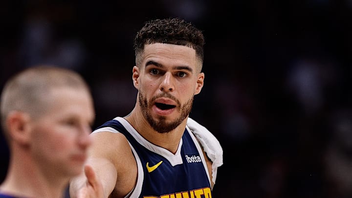 May 11, 2025; Denver, Colorado, USA; Denver Nuggets forward Michael Porter Jr. (1) gestures to referee Tyler Ford in the second quarter against the Oklahoma City Thunder during game four of the second round of the 2025 NBA Playoffs at Ball Arena. Mandatory Credit: Isaiah J. Downing-Imagn Images