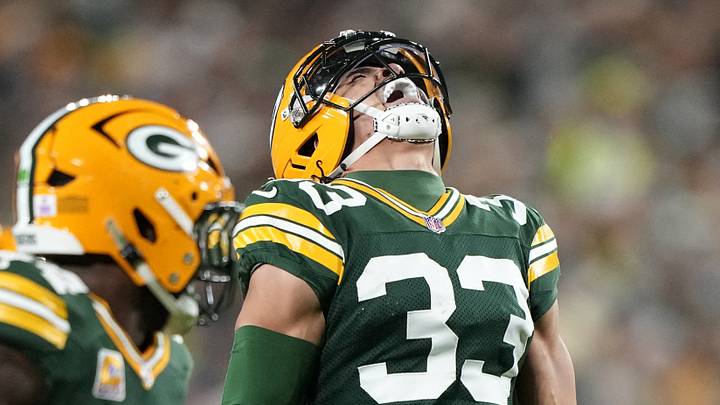 Oct 18, 2026; Green Bay, Wisconsin, USA;  Green Bay Packers safety Evan Williams (33) celebrates after making an interception against the Dallas Cowboys during the second quarter at Lambeau Field.  Mandatory Credit: Jeff Hanisch-Imagn Images