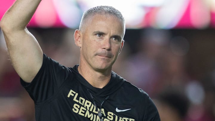 Florida State Seminoles head coach Mike Norvell walks down the field. The Miami Hurricanes lead the Florida State Seminoles 14-3 at the half on Saturday, Oct. 4, 2025.