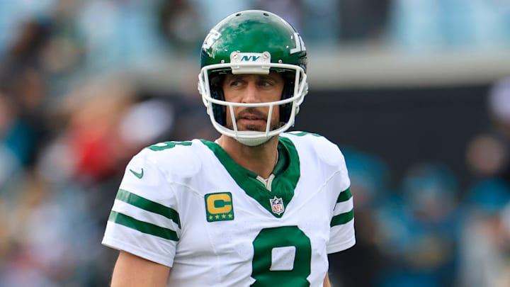 New York Jets quarterback Aaron Rodgers (8) looks on before an NFL football matchup Sunday, Dec. 15, 2024 at EverBank Stadium in Jacksonville, Fla. [Corey Perrine/Florida Times-Union]