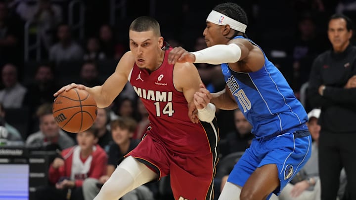 Nov 24, 2025; Miami, Florida, USA; Miami Heat guard Tyler Herro (14) drives to the basket as Dallas Mavericks guard Brandon Williams (10) defends during the first half at Kaseya Center. Mandatory Credit: Jim Rassol-Imagn Images Nov 24, 2025; Miami, Florida, USA; Miami Heat guard Tyler Herro (14) drives to the basket as Dallas Mavericks guard Brandon Williams (10) defends during the first half at Kaseya Center. Mandatory Credit: Jim Rassol-Imagn Images