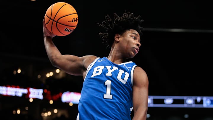Mar 11, 2026; Kansas City, MO, USA; BYU Cougars guard Robert Wright III (1) rebounds during the first half against the West Virginia Mountaineers at T-Mobile Center. Mandatory Credit: William Purnell-Imagn Images Mar 11, 2026; Kansas City, MO, USA; BYU Cougars guard Robert Wright III (1) rebounds during the first half against the West Virginia Mountaineers at T-Mobile Center. Mandatory Credit: William Purnell-Imagn Images