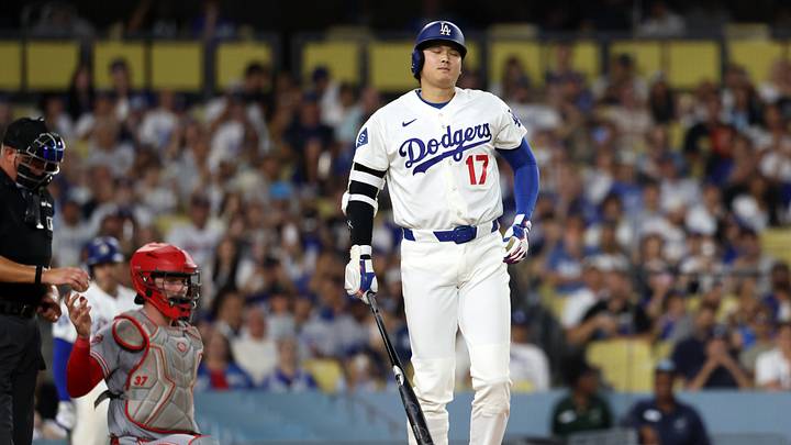 Sep 7, 2026; Los Angeles, California, USA;  Los Angeles Dodgers designated hitter Shohei Ohtani (17) reacts after fouling a ball off his foot during the seventh inning against the Cincinnati Reds at Dodger Stadium. Mandatory Credit: Kiyoshi Mio-Imagn Images