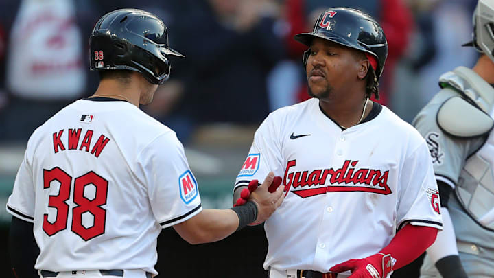 Cleveland Guardians third baseman Jose Ramirez (11) celebrates with Cleveland Guardians outfielder Steven Kwan (38) at home after his two-run homer during the fifth inning of the Cleveland Guardians' home opener against the Chicago White Sox, Monday, April 8, 2024, in Cleveland, Ohio.