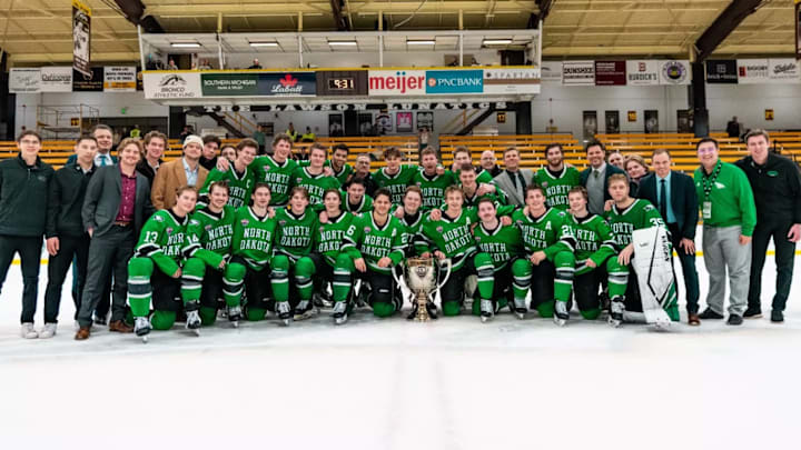 North Dakota poses with the Penrose Cup after locking up the NCHC regular season title during its likely final trip to Lawson Ice Arena in Kalamazoo, Mich. Western Michigan will open a new arena in 2027.  