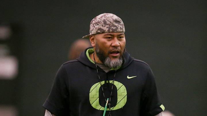 Oregon defensive line coach Tony Tuioti leads practice with the Ducks Thursday, April 20, 2023 at the Moshofsky Center in Eugene, Ore.