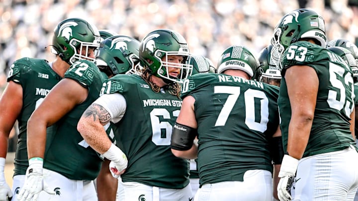 Michigan State's offensive line, from left, Ashton Lepo, Dallas Fincher, Tanner Miller, Luke Newman and Brandon Baldwin huddle up during the fourth quarter in the game against Prairie View A&M on Saturday, Sept. 14, 2024, at Spartan Stadium in East Lansing. Michigan State's offensive line, from left, Ashton Lepo, Dallas Fincher, Tanner Miller, Luke Newman and Brandon Baldwin huddle up during the fourth quarter in the game against Prairie View A&M on Saturday, Sept. 14, 2024, at Spartan Stadium in East Lansing.