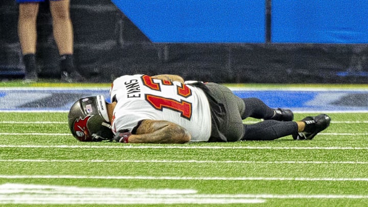 Oct 20, 2025; Detroit, Michigan, USA; Tampa Bay Buccaneers wide receiver Mike Evans (13) lays on the turf after an injury against the Detroit Lions during the first half at Ford Field. Mandatory Credit: David Reginek-Imagn Images