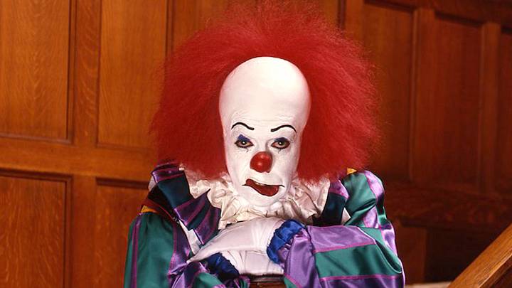 Tim Curry as Pennywise in It