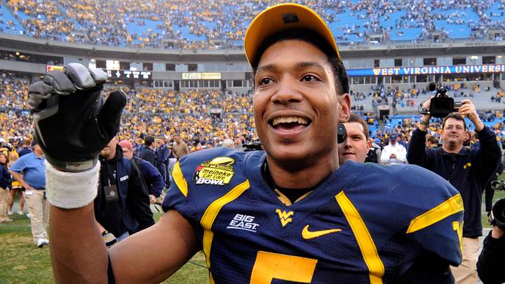 Dec. 27, 2008; Charlotte, NC, USA; West Virginia Mountaneers quarterback Pat White (5) reacts after the Mountaineers 31-30 victory against the North Carolina Tar Heels at Bank of America Stadium. Mandatory Credit: Bob Donnan-USA TODAY Sports Dec. 27, 2008; Charlotte, NC, USA; West Virginia Mountaneers quarterback Pat White (5) reacts after the Mountaineers 31-30 victory against the North Carolina Tar Heels at Bank of America Stadium. Mandatory Credit: Bob Donnan-USA TODAY Sports