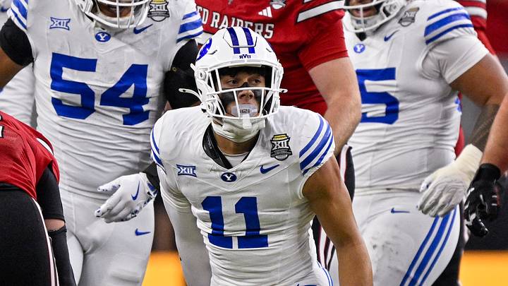 Dec 6, 2025; Arlington, TX, USA; BYU Cougars safety Faletau Satuala (11) celebrates during the game between the Red Raiders and the Cougars at AT&T Stadium. Mandatory Credit: Jerome Miron-Imagn Images Dec 6, 2025; Arlington, TX, USA; BYU Cougars safety Faletau Satuala (11) celebrates during the game between the Red Raiders and the Cougars at AT&T Stadium. Mandatory Credit: Jerome Miron-Imagn Images