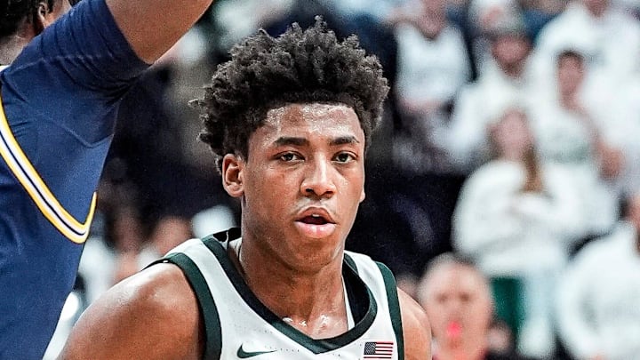 Michigan guard L.J. Cason (2) defends Michigan State guard Jeremy Fears Jr. (1) during the first half at Breslin Center in East Lansing on Friday, Jan. 30, 2026.