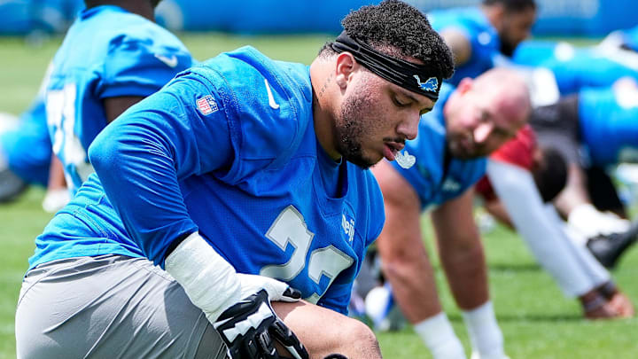 Detroit Lions guard Christian Mahogany (73) practices during OTA at Meijer Performance Center in Allen Park on Friday, May 30, 2025.