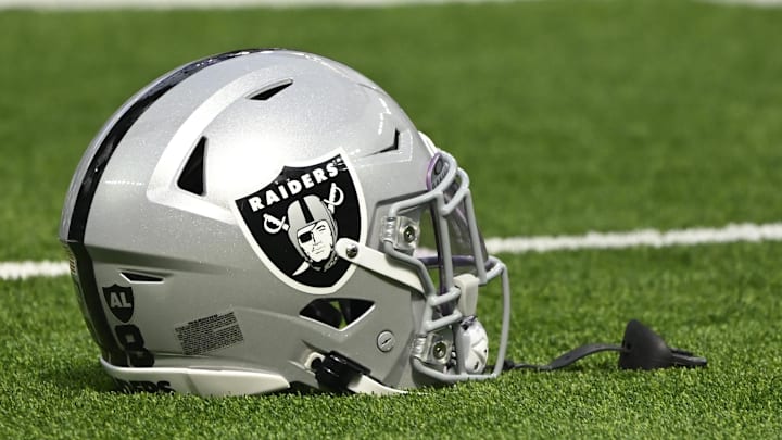 Las Vegas Raiders helmet on the turn at SoFi Stadium during pregame warmups before an NFL game against the Los Angeles Rams.