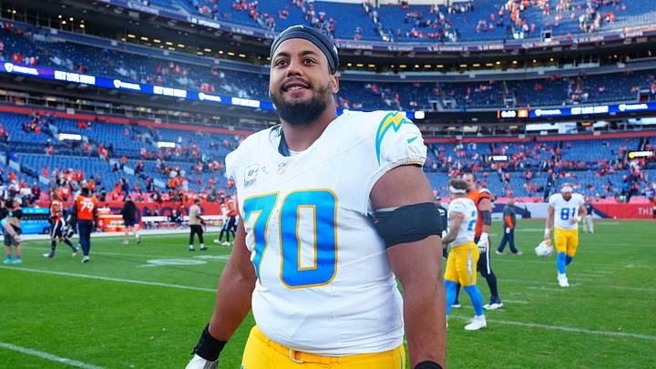 Oct 13, 2024; Denver, Colorado, USA; Los Angeles Chargers offensive tackle Rashawn Slater (70) following the win over the Denver Broncos at Empower Field at Mile High. Mandatory Credit: Ron Chenoy-Imagn Images Oct 13, 2024; Denver, Colorado, USA; Los Angeles Chargers offensive tackle Rashawn Slater (70) following the win over the Denver Broncos at Empower Field at Mile High. Mandatory Credit: Ron Chenoy-Imagn Images