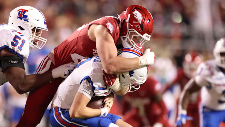 Arkansas Razorbacks defensive lineman Landon Jackson (40) sacks Louisiana Tech Bulldogs quarterback Evan Bullock (7) during the fourth quarter at Donald W. Reynolds Razorback Stadium. Arkansas won 35-14. Arkansas Razorbacks defensive lineman Landon Jackson (40) sacks Louisiana Tech Bulldogs quarterback Evan Bullock (7) during the fourth quarter at Donald W. Reynolds Razorback Stadium. Arkansas won 35-14.