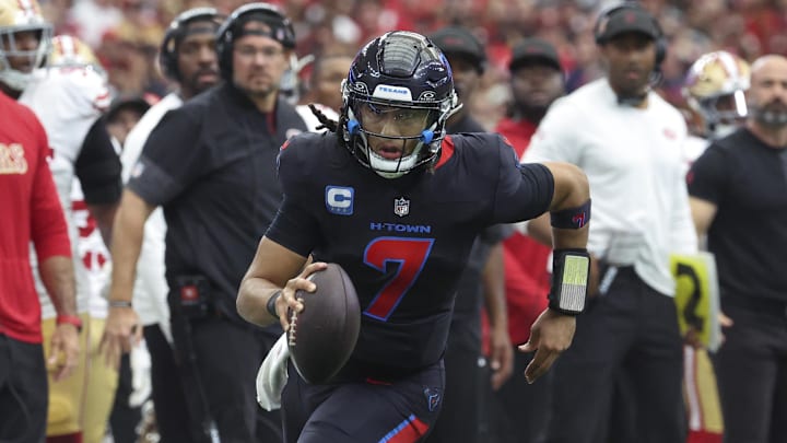 Oct 26, 2025; Houston, Texas, USA; Houston Texans quarterback C.J. Stroud (7) runs with the ball during the fourth quarter against the San Francisco 49ers at NRG Stadium. Mandatory Credit: Troy Taormina-Imagn Images