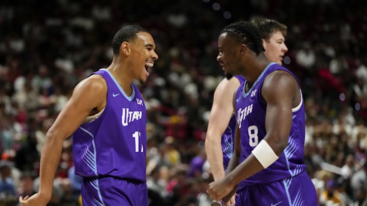 Jul 14, 2025; Las Vegas, NV, USA; Utah Jazz forward John Tonje (17) celebrates with guard Isaiah Collier (8) after scoring against the San Antonio Spurs during the second half of a NBA basketball game at the Thomas & Mack Center. Mandatory Credit: Lucas Peltier-Imagn Images Jul 14, 2025; Las Vegas, NV, USA; Utah Jazz forward John Tonje (17) celebrates with guard Isaiah Collier (8) after scoring against the San Antonio Spurs during the second half of a NBA basketball game at the Thomas & Mack Center. Mandatory Credit: Lucas Peltier-Imagn Images