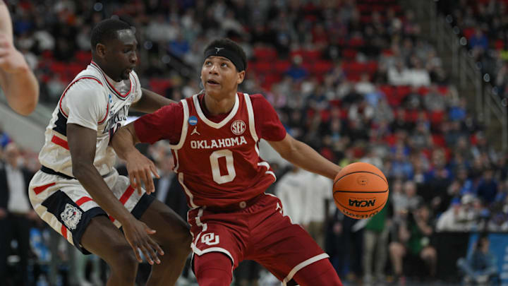 Mar 21, 2025; Raleigh, NC, USA;  Oklahoma Sooners guard Jeremiah Fears (0) controls the ball against Connecticut Huskies during the second half at Lenovo Center. 