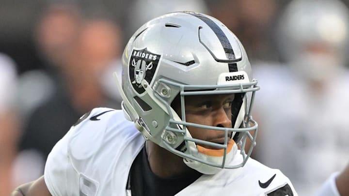 Nov 30, 2025; Inglewood, California, USA; Las Vegas Raiders quarterback Geno Smith (7) drops back to pass against the Los Angeles Chargers during the first half at SoFi Stadium. Mandatory Credit: Jayne Kamin-Oncea-Imagn Images