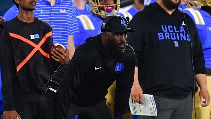 Aug 30, 2025; Pasadena, California, USA; UCLA Bruins head coach DeShaun Foster watches game action against the Utah Utes during the first half at Rose Bowl. Mandatory Credit: Gary A. Vasquez-Imagn Images