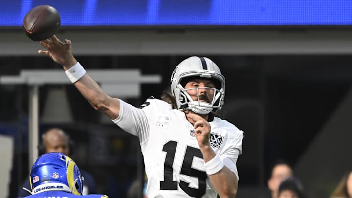Oct 20, 2024; Inglewood, California, USA; Las Vegas Raiders quarterback Gardner Minshew (15) gets off a pass under pressure by Los Angeles Rams linebacker Byron Young (0) during the third quarter at SoFi Stadium. Mandatory Credit: Robert Hanashiro-Imagn Images Oct 20, 2024; Inglewood, California, USA; Las Vegas Raiders quarterback Gardner Minshew (15) gets off a pass under pressure by Los Angeles Rams linebacker Byron Young (0) during the third quarter at SoFi Stadium. Mandatory Credit: Robert Hanashiro-Imagn Images