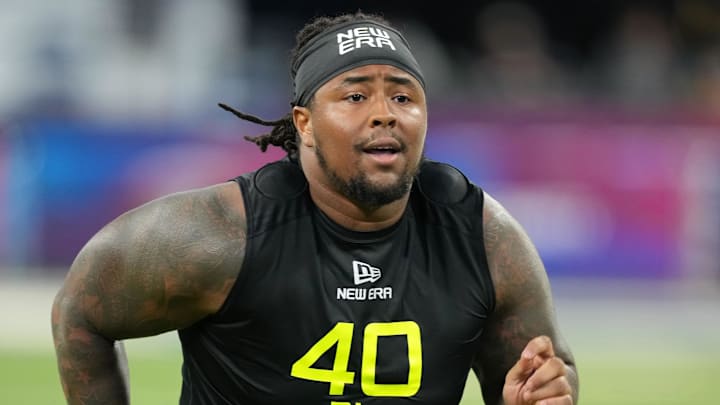 Feb 27, 2025; Indianapolis, IN, USA; Ohio State defensive lineman Tyleik Williams (DL40) participates in drills during the 2025 NFL Combine at Lucas Oil Stadium. Mandatory Credit: Kirby Lee-Imagn Images Feb 27, 2025; Indianapolis, IN, USA; Ohio State defensive lineman Tyleik Williams (DL40) participates in drills during the 2025 NFL Combine at Lucas Oil Stadium. Mandatory Credit: Kirby Lee-Imagn Images