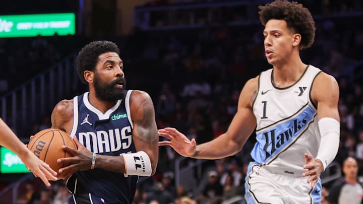 Nov 25, 2024; Atlanta, Georgia, USA; Dallas Mavericks guard Kyrie Irving (11) drives to the basket against the Atlanta Hawks in the first quarter at State Farm Arena. Mandatory Credit: Brett Davis-Imagn Images Nov 25, 2024; Atlanta, Georgia, USA; Dallas Mavericks guard Kyrie Irving (11) drives to the basket against the Atlanta Hawks in the first quarter at State Farm Arena. Mandatory Credit: Brett Davis-Imagn Images