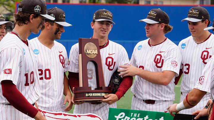 Oklahoma Sooners celebrate their 13-2 win over Kansas Jayhawks during the NCAA Lawrence Super Regional game at Hoglund Ballpark on June 8, 2026. Oklahoma Sooners celebrate their 13-2 win over Kansas Jayhawks during the NCAA Lawrence Super Regional game at Hoglund Ballpark on June 8, 2026.