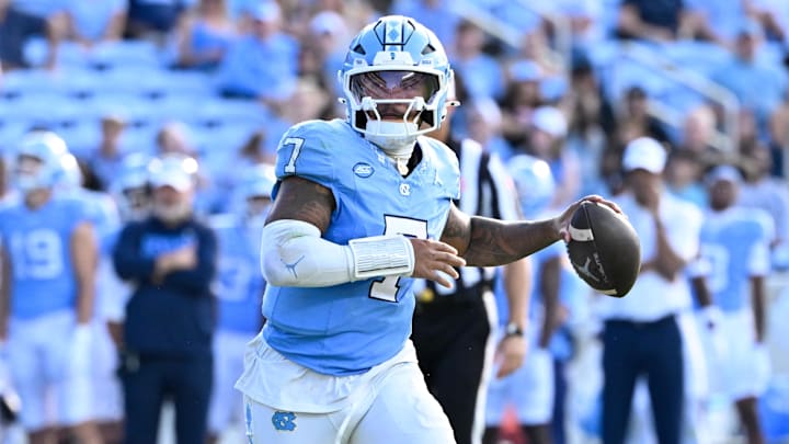 Sep 13, 2025; Chapel Hill, North Carolina, USA; North Carolina Tar Heels quarterback Gio Lopez (7) looks to pass in the third quarter at Kenan Stadium. Mandatory Credit: Bob Donnan-Imagn Images