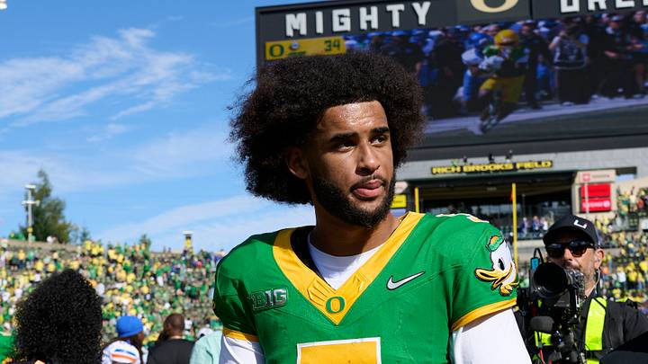 Sep 5, 2026; Eugene, Oregon, USA; Oregon Ducks quarterback Dante Moore (5) walks off the field after a game against the Boise State Broncos at Autzen Stadium. Sep 5, 2026; Eugene, Oregon, USA; Oregon Ducks quarterback Dante Moore (5) walks off the field after a game against the Boise State Broncos at Autzen Stadium.