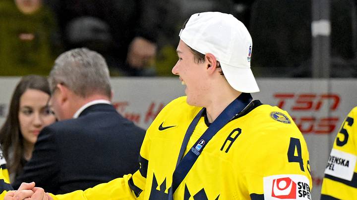 Jan 5, 2026; St. Paul, Minnesota, USA; Sweden defensemen Felix Ohrqvist (3) and defensemen Leo Wallenius  (4) celebrate a victory over Czechia after the final of the 2026 IIHF World Junior Championship ice hockey tournament at Grand Casino Arena. Mandatory Credit: Nick Wosika-Imagn Images