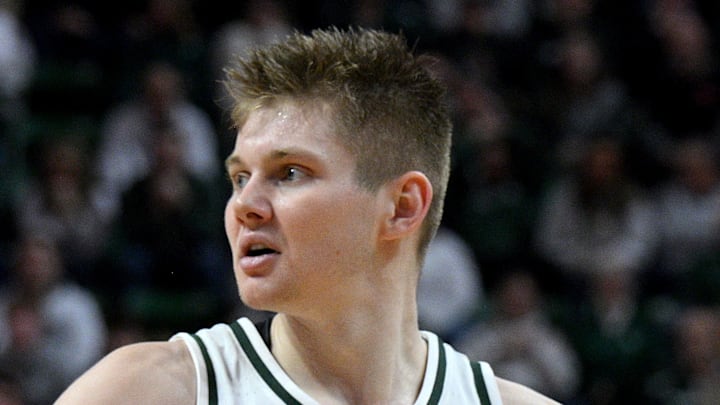 Jan 24, 2026; East Lansing, Michigan, USA;  Michigan State Spartans forward Jaxon Kohler (0) reacts to a Michigan State Spartans forward Coen Carr (55) dunk during the second half against the Maryland Terrapins at Jack Breslin Student Events Center.